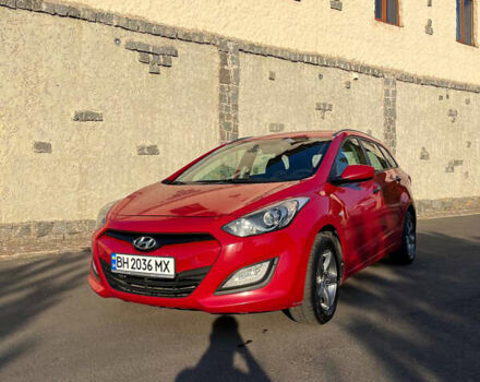 Красный Хендай i30, объемом двигателя 1.4 л и пробегом 190 тыс. км за 6900 $, фото 1 на Automoto.ua