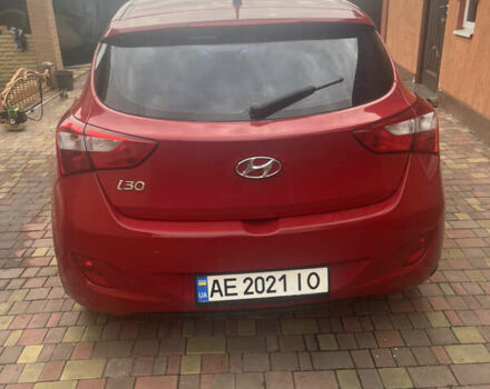 Красный Хендай i30, объемом двигателя 1.6 л и пробегом 140 тыс. км за 6500 $, фото 1 на Automoto.ua
