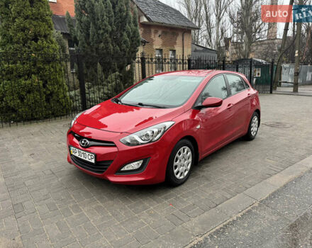 Красный Хендай i30, объемом двигателя 1.4 л и пробегом 72 тыс. км за 7800 $, фото 1 на Automoto.ua
