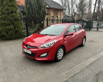 Красный Хендай i30, объемом двигателя 1.4 л и пробегом 72 тыс. км за 7800 $, фото 1 на Automoto.ua