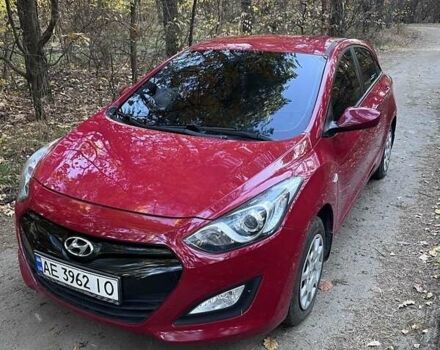 Червоний Хендай i30, об'ємом двигуна 1.4 л та пробігом 140 тис. км за 8300 $, фото 1 на Automoto.ua