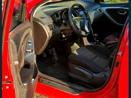Красный Хендай i30, объемом двигателя 1.4 л и пробегом 148 тыс. км за 7600 $, фото 1 на Automoto.ua