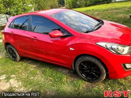 Красный Хендай i30, объемом двигателя 1.4 л и пробегом 148 тыс. км за 7400 $, фото 1 на Automoto.ua