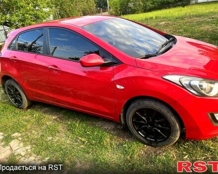 Червоний Хендай i30, об'ємом двигуна 1.4 л та пробігом 148 тис. км за 7400 $, фото 1 на Automoto.ua