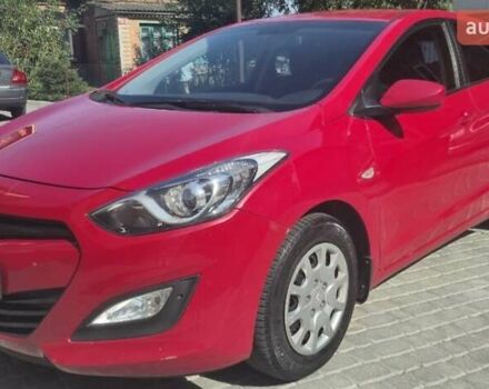 Красный Хендай i30, объемом двигателя 1.4 л и пробегом 155 тыс. км за 7600 $, фото 1 на Automoto.ua