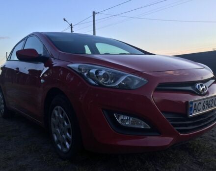 Красный Хендай i30, объемом двигателя 1.4 л и пробегом 200 тыс. км за 6700 $, фото 1 на Automoto.ua