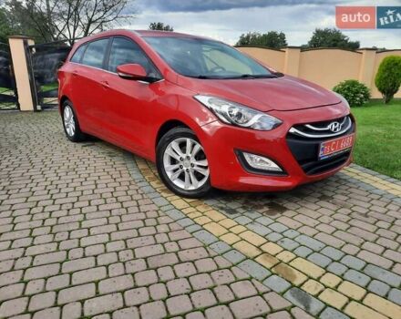 Червоний Хендай i30, об'ємом двигуна 1.6 л та пробігом 125 тис. км за 9250 $, фото 1 на Automoto.ua