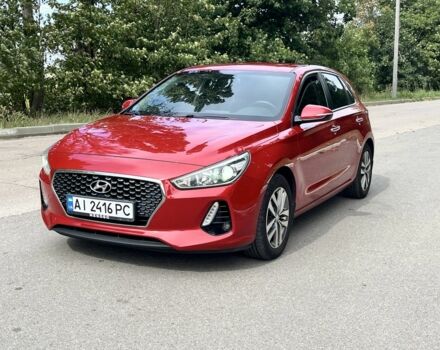 Красный Хендай i30, объемом двигателя 1.6 л и пробегом 112 тыс. км за 13999 $, фото 1 на Automoto.ua