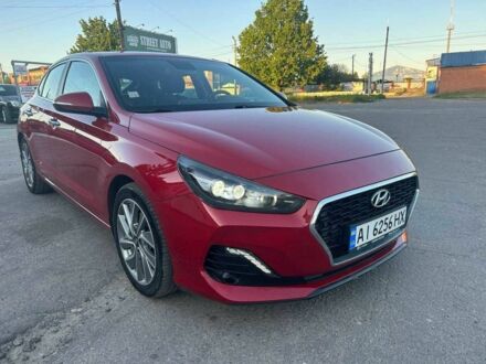 Червоний Хендай i30, об'ємом двигуна 1.4 л та пробігом 106 тис. км за 15800 $, фото 1 на Automoto.ua