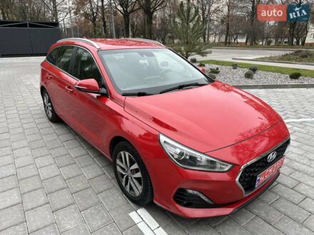 Красный Хендай i30, объемом двигателя 1.4 л и пробегом 240 тыс. км за 10500 $, фото 1 на Automoto.ua