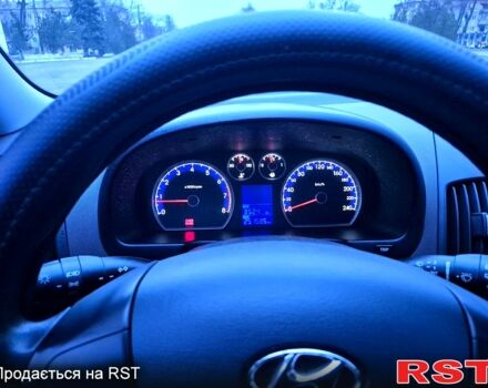 Серый Хендай i30, объемом двигателя 1.4 л и пробегом 251 тыс. км за 5400 $, фото 9 на Automoto.ua