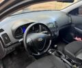 Серый Хендай i30, объемом двигателя 1.4 л и пробегом 242 тыс. км за 4700 $, фото 4 на Automoto.ua