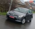 Серый Хендай i30, объемом двигателя 1.6 л и пробегом 244 тыс. км за 8700 $, фото 1 на Automoto.ua