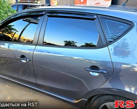Серый Хендай i30, объемом двигателя 1.6 л и пробегом 230 тыс. км за 7800 $, фото 2 на Automoto.ua