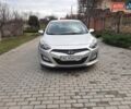 Серый Хендай i30, объемом двигателя 1.4 л и пробегом 72 тыс. км за 9500 $, фото 1 на Automoto.ua