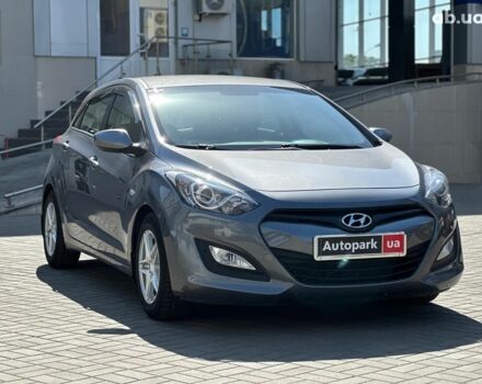 Сірий Хендай i30, об'ємом двигуна 1.4 л та пробігом 76 тис. км за 9940 $, фото 2 на Automoto.ua