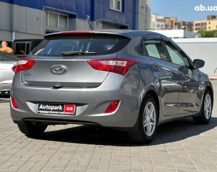Сірий Хендай i30, об'ємом двигуна 1.4 л та пробігом 76 тис. км за 9940 $, фото 4 на Automoto.ua