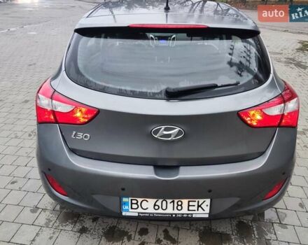 Серый Хендай i30, объемом двигателя 1.4 л и пробегом 77 тыс. км за 9100 $, фото 2 на Automoto.ua