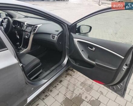Серый Хендай i30, объемом двигателя 1.4 л и пробегом 77 тыс. км за 9100 $, фото 5 на Automoto.ua
