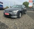 Сірий Хендай i30, об'ємом двигуна 1.58 л та пробігом 220 тис. км за 6700 $, фото 1 на Automoto.ua