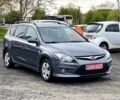 Сірий Хендай i30, об'ємом двигуна 1.4 л та пробігом 209 тис. км за 6250 $, фото 1 на Automoto.ua