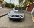 Серый Хендай i30, объемом двигателя 1.6 л и пробегом 159 тыс. км за 6999 $, фото 1 на Automoto.ua