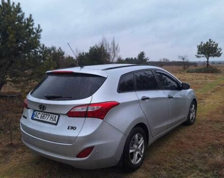 Серый Хендай i30, объемом двигателя 1.4 л и пробегом 262 тыс. км за 7575 $, фото 3 на Automoto.ua