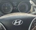 Сірий Хендай i30, об'ємом двигуна 1.58 л та пробігом 179 тис. км за 10500 $, фото 5 на Automoto.ua