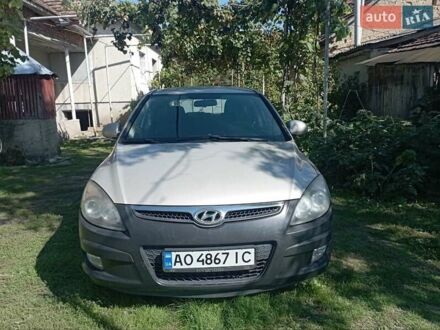 Серый Хендай i30, объемом двигателя 1.4 л и пробегом 220 тыс. км за 5400 $, фото 1 на Automoto.ua