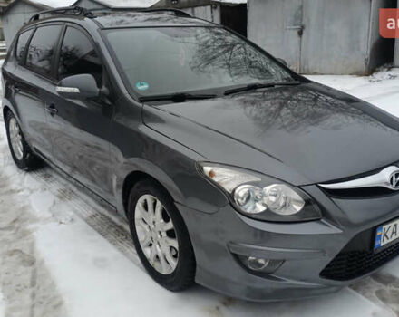 Серый Хендай i30, объемом двигателя 1.58 л и пробегом 297 тыс. км за 5750 $, фото 1 на Automoto.ua