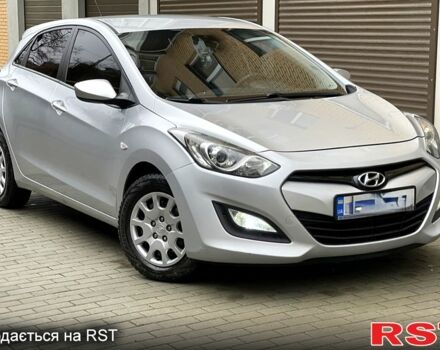 Серый Хендай i30, объемом двигателя 1.6 л и пробегом 13300 тыс. км за 10500 $, фото 1 на Automoto.ua