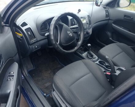 Синий Хендай i30, объемом двигателя 1.4 л и пробегом 220 тыс. км за 4600 $, фото 4 на Automoto.ua