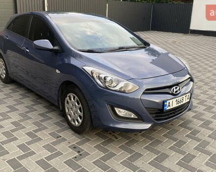 Синій Хендай i30, об'ємом двигуна 1.4 л та пробігом 164 тис. км за 7700 $, фото 2 на Automoto.ua