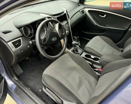 Синий Хендай i30, объемом двигателя 1.4 л и пробегом 91 тыс. км за 3499 $, фото 8 на Automoto.ua