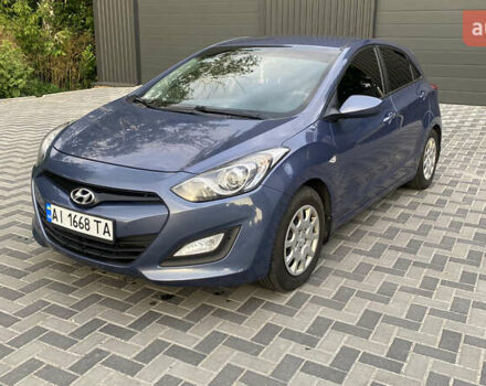 Синій Хендай i30, об'ємом двигуна 1.4 л та пробігом 164 тис. км за 7700 $, фото 1 на Automoto.ua