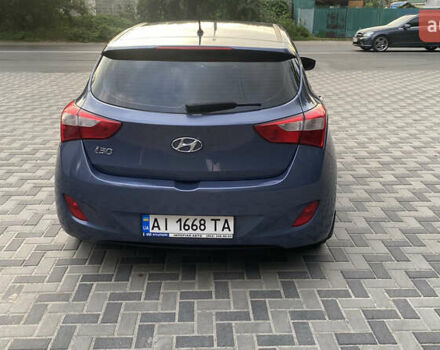 Синій Хендай i30, об'ємом двигуна 1.4 л та пробігом 164 тис. км за 7700 $, фото 4 на Automoto.ua