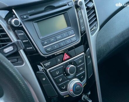 Синий Хендай i30, объемом двигателя 1.4 л и пробегом 178 тыс. км за 7690 $, фото 15 на Automoto.ua