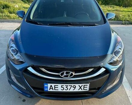 Синій Хендай i30, об'ємом двигуна 2 л та пробігом 64 тис. км за 12800 $, фото 1 на Automoto.ua