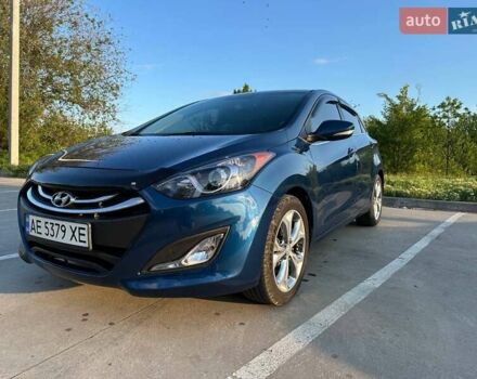 Синій Хендай i30, об'ємом двигуна 2 л та пробігом 64 тис. км за 12800 $, фото 2 на Automoto.ua