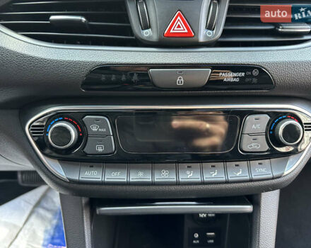 Синий Хендай i30, объемом двигателя 1.4 л и пробегом 205 тыс. км за 10950 $, фото 116 на Automoto.ua