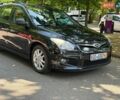 Черный Хендай i30 Wagon, объемом двигателя 1.4 л и пробегом 210 тыс. км за 5050 $, фото 1 на Automoto.ua