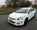 Белый Хендай и40, объемом двигателя 2 л и пробегом 148 тыс. км за 11500 $, фото 1 на Automoto.ua
