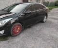 Чорний Хендай і40, об'ємом двигуна 1.7 л та пробігом 245 тис. км за 7000 $, фото 1 на Automoto.ua