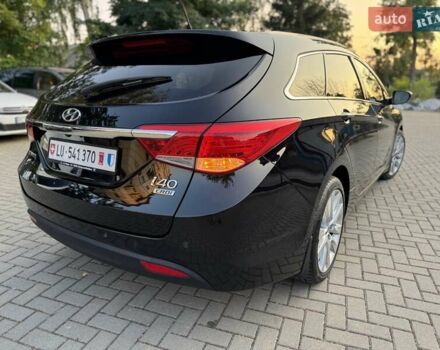 Чорний Хендай і40, об'ємом двигуна 1.7 л та пробігом 214 тис. км за 8999 $, фото 14 на Automoto.ua
