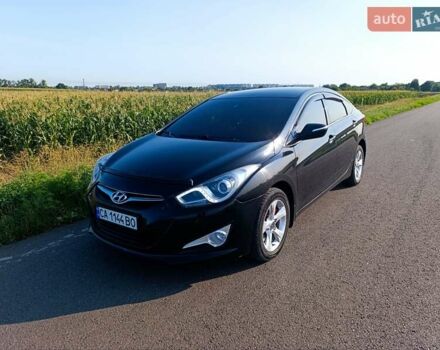 Черный Хендай и40, объемом двигателя 1.69 л и пробегом 215 тыс. км за 9300 $, фото 1 на Automoto.ua