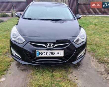 Чорний Хендай і40, об'ємом двигуна 1.7 л та пробігом 234 тис. км за 10750 $, фото 1 на Automoto.ua