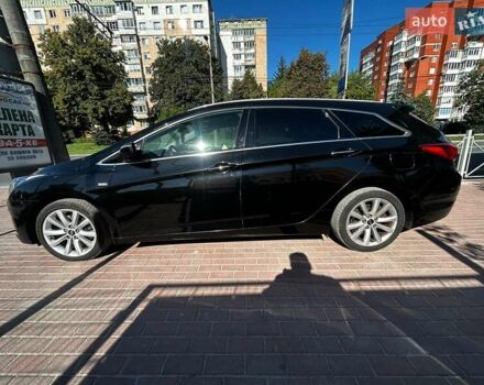 Чорний Хендай і40, об'ємом двигуна 2 л та пробігом 230 тис. км за 9990 $, фото 1 на Automoto.ua