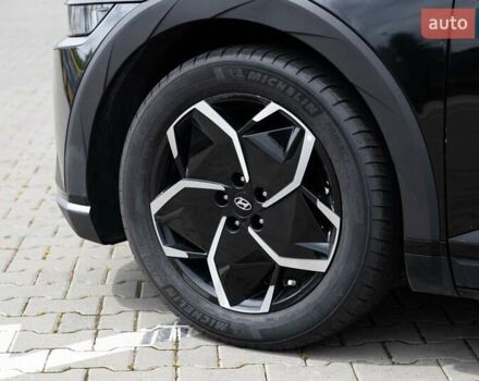 Черный Хендай Ioniq 5, объемом двигателя 0 л и пробегом 56 тыс. км за 25500 $, фото 2 на Automoto.ua