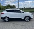 Белый Хендай их35, объемом двигателя 2 л и пробегом 215 тыс. км за 12034 $, фото 1 на Automoto.ua
