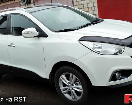 Белый Хендай их35, объемом двигателя 2 л и пробегом 215 тыс. км за 9900 $, фото 5 на Automoto.ua